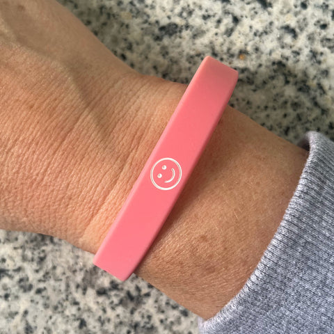 Herzlein Armbändchen aus Silikone in Pink mit Smiley Smily