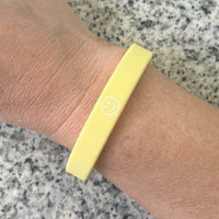 Herzlein Armbändchen aus Silikone mit Smiley Smily in Pastell Gelb