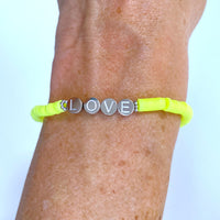 Herzlein® NEON-Armbändchen "LOVE" in Gelb